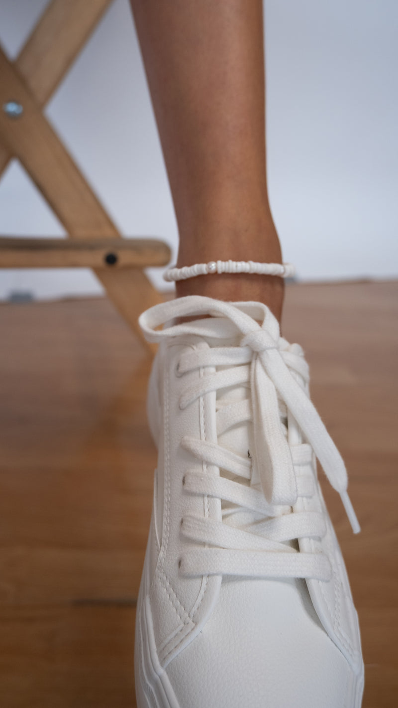 Tobillera de concha blanca con perla