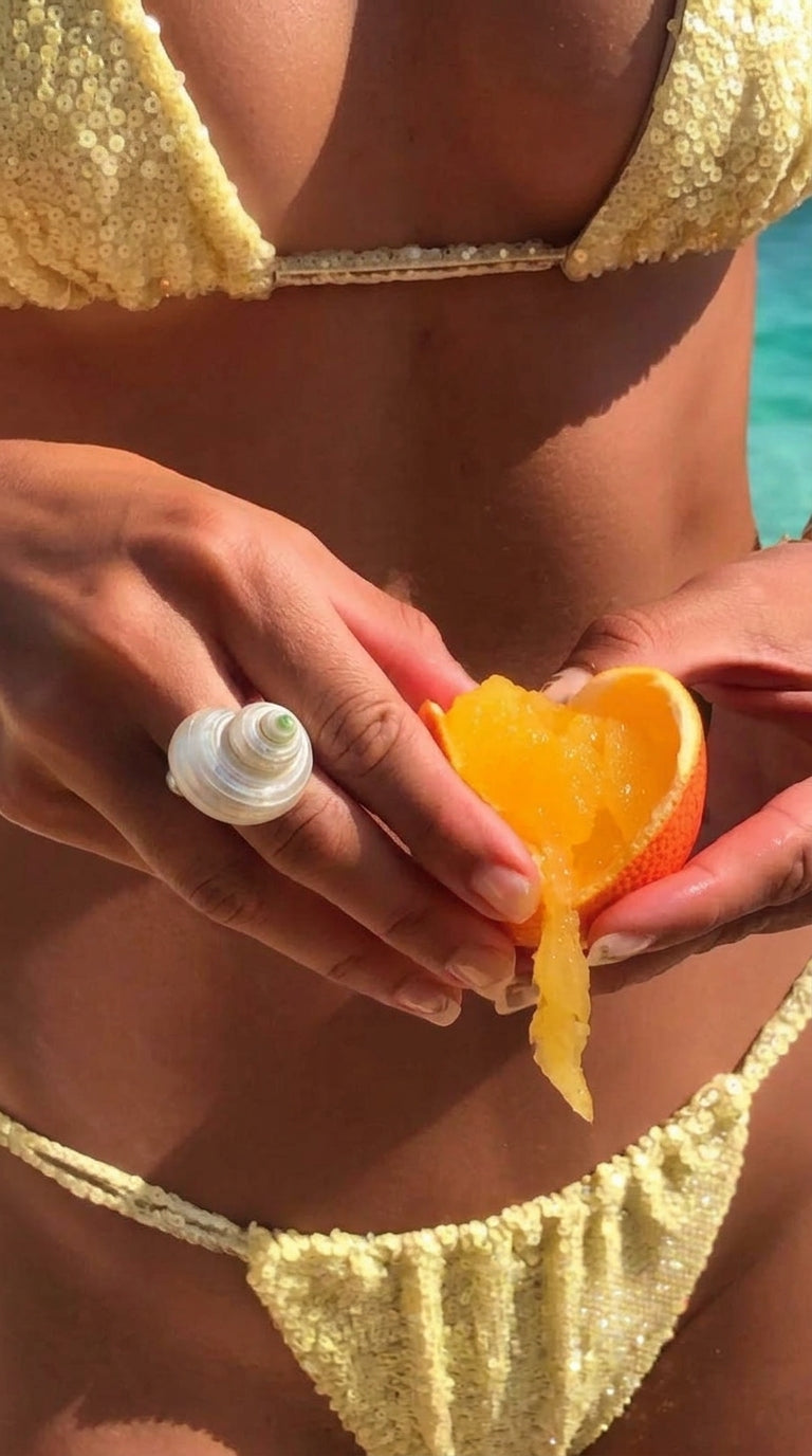 Anillo con concha natural y perla
